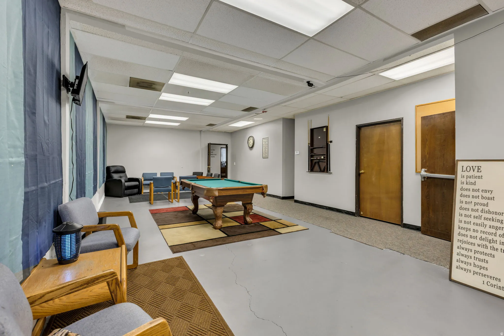 Game room featuring pool table and a drop ceiling
