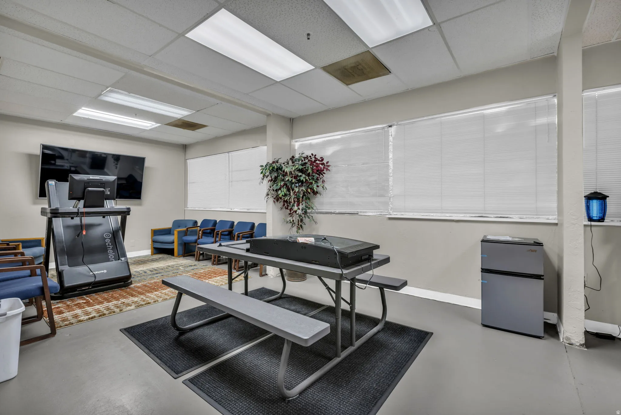 Interior space featuring a paneled ceiling