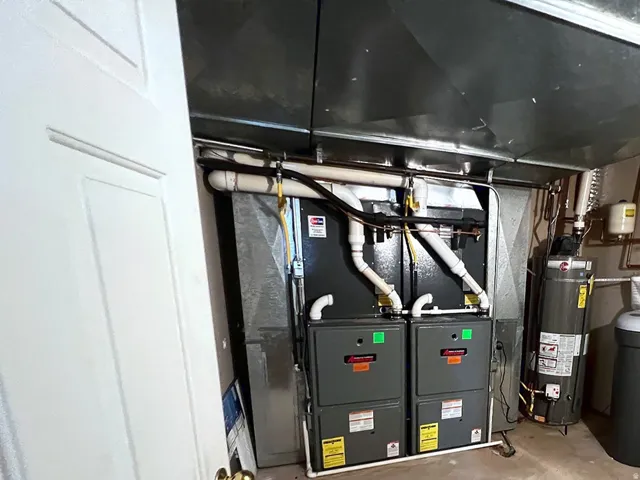 Dual HVAC units, water heater, and water softener system