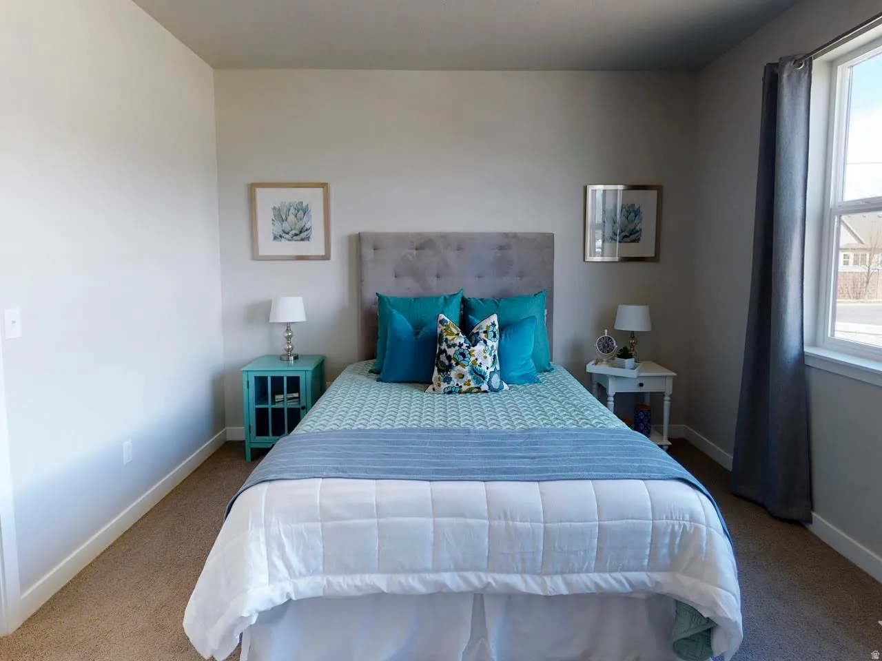 Carpeted bedroom with baseboards