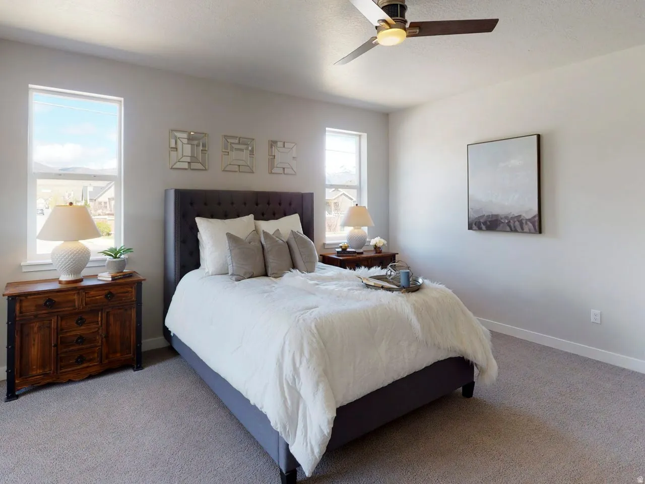 Bedroom with carpet floors and ceiling fan