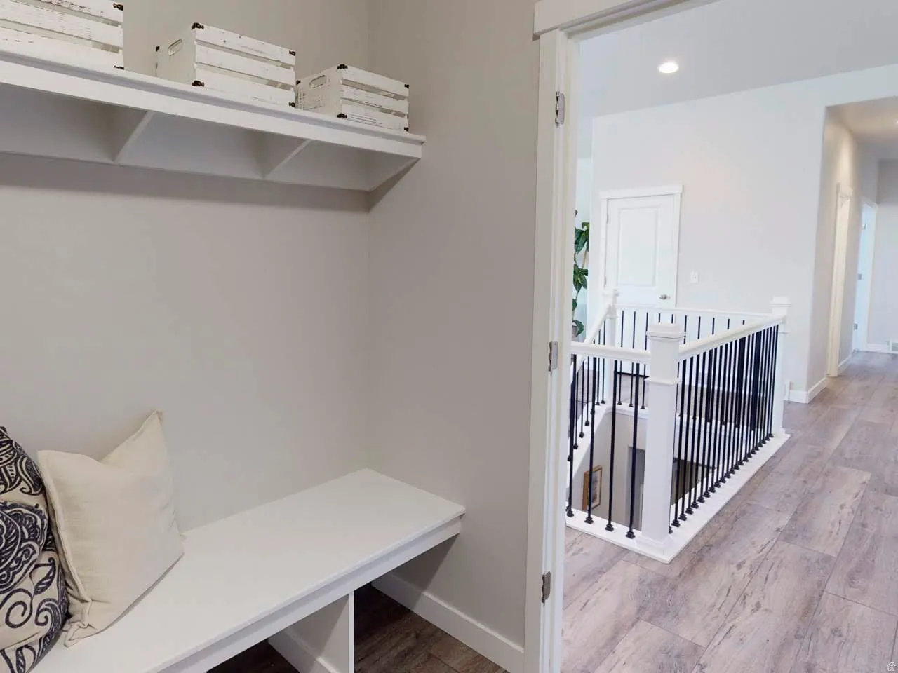 Mudroom featuring recessed lighting and light wood-type flooring