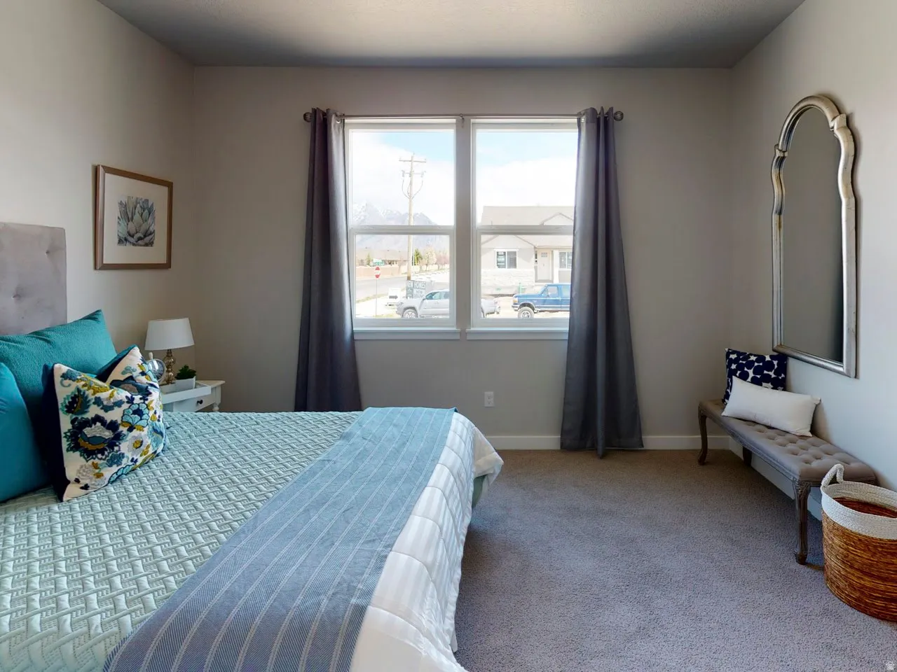 Carpeted bedroom featuring baseboards