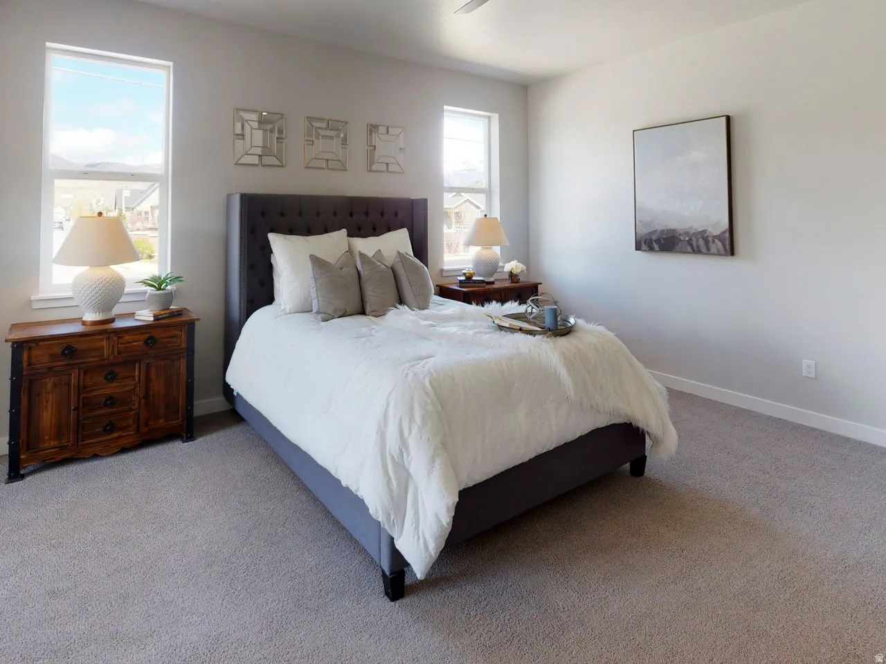 Bedroom featuring carpet flooring and baseboards