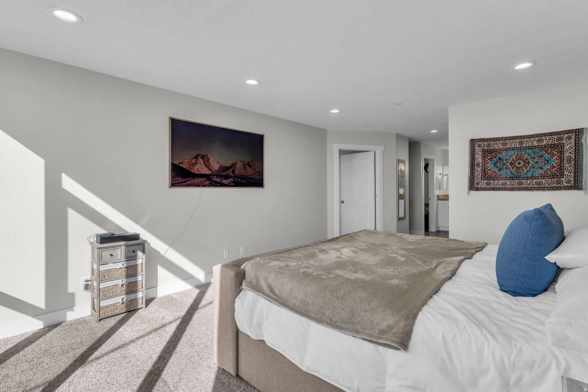 Primary Bedroom with dual walk-in closets and ensuite bath