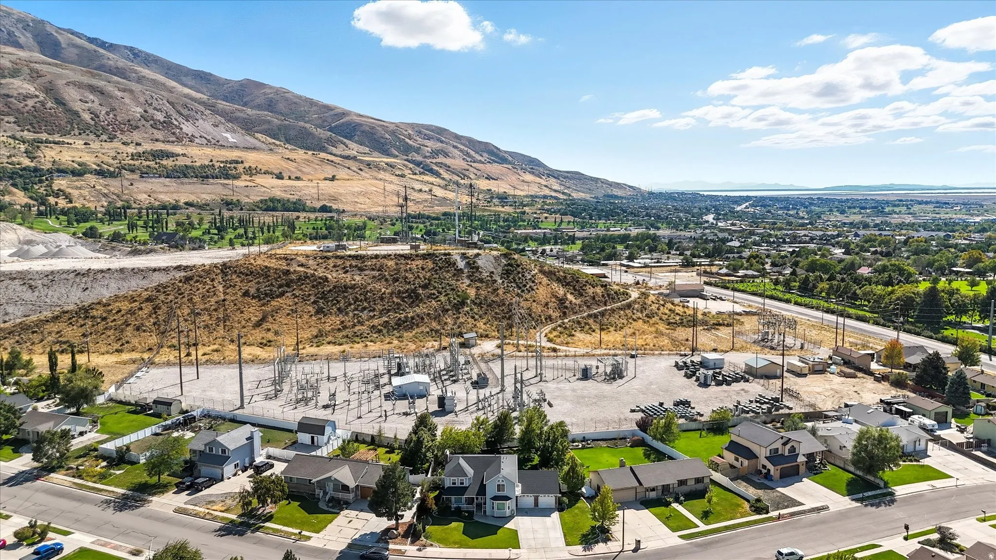 Aerial perspective of suburban area with mountains