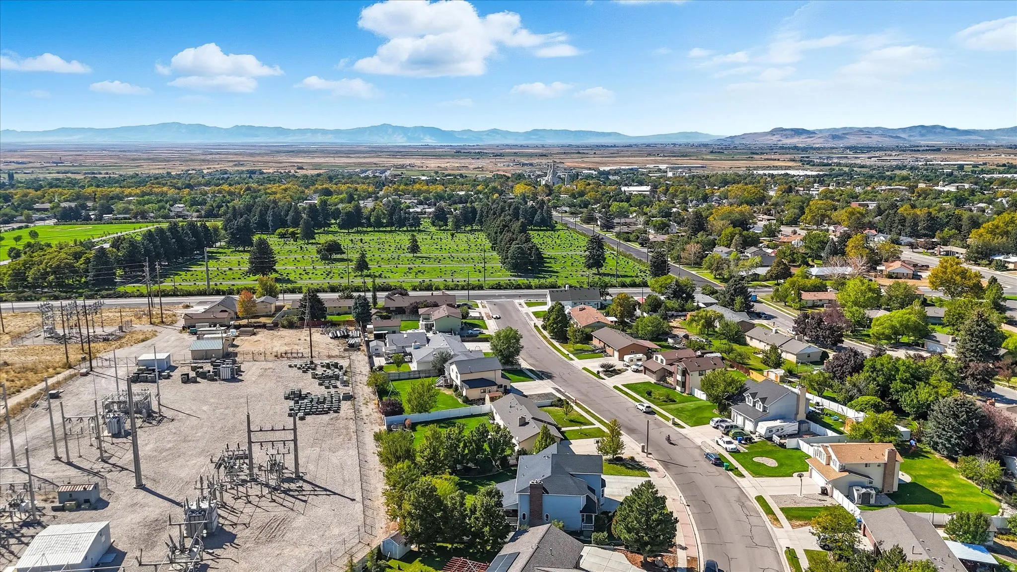 Aerial view of residential area with a mountainous background