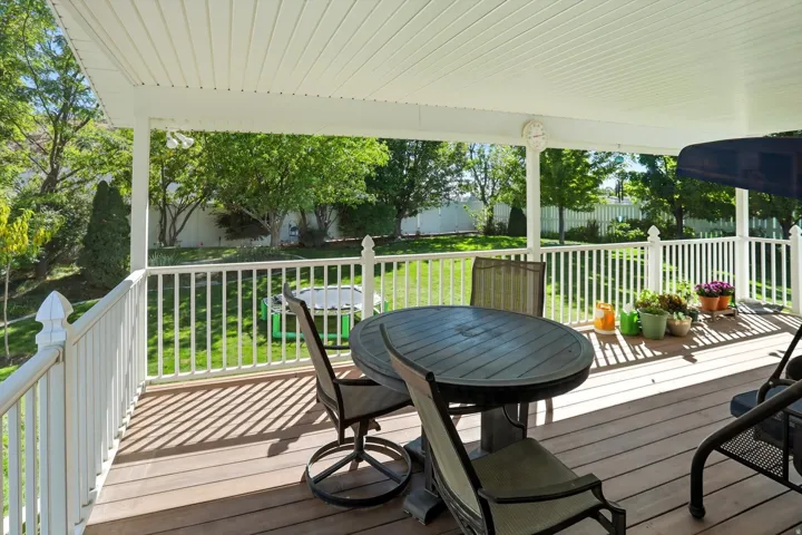 Wooden terrace featuring outdoor dining space