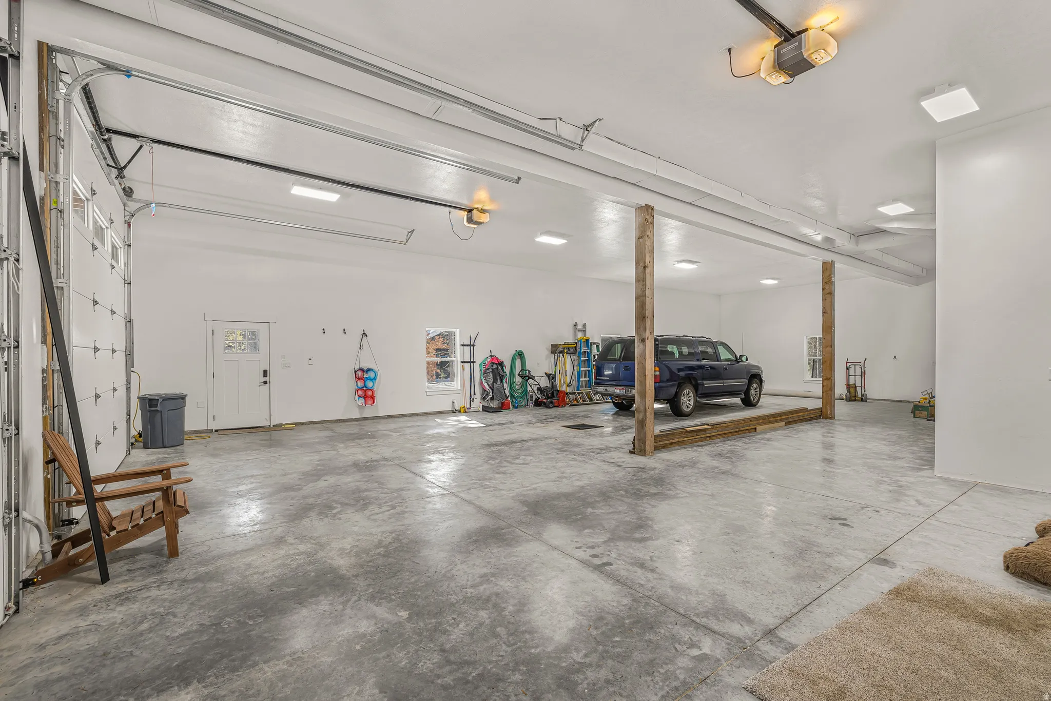 Garage featuring a garage door opener