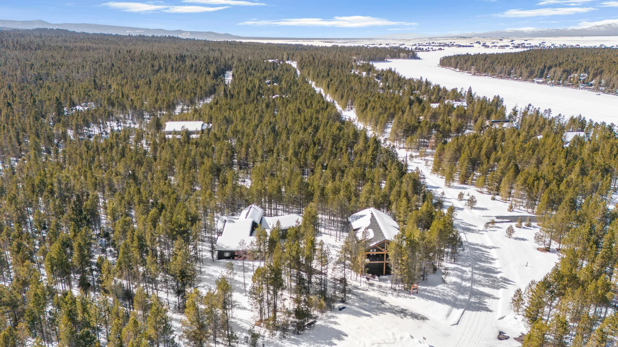 Aerial overview of property's location with mountains