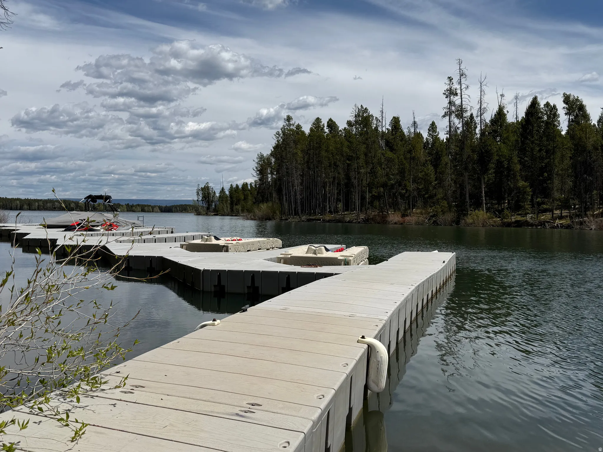 Floating dock system extending into tranquil waters