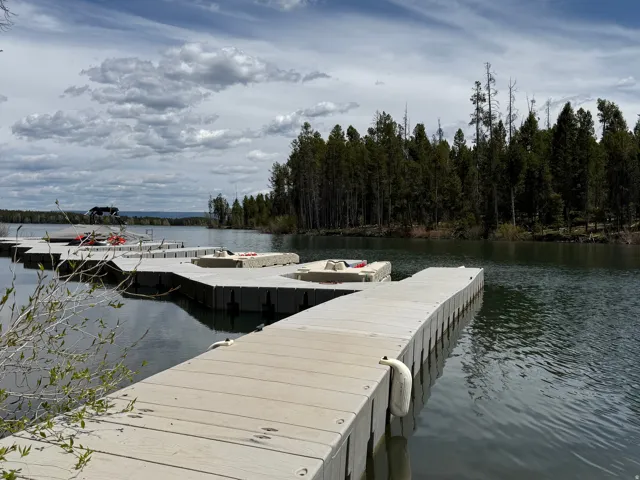 Floating dock system extending into tranquil waters