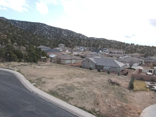 Aerial view of residential area with mountains