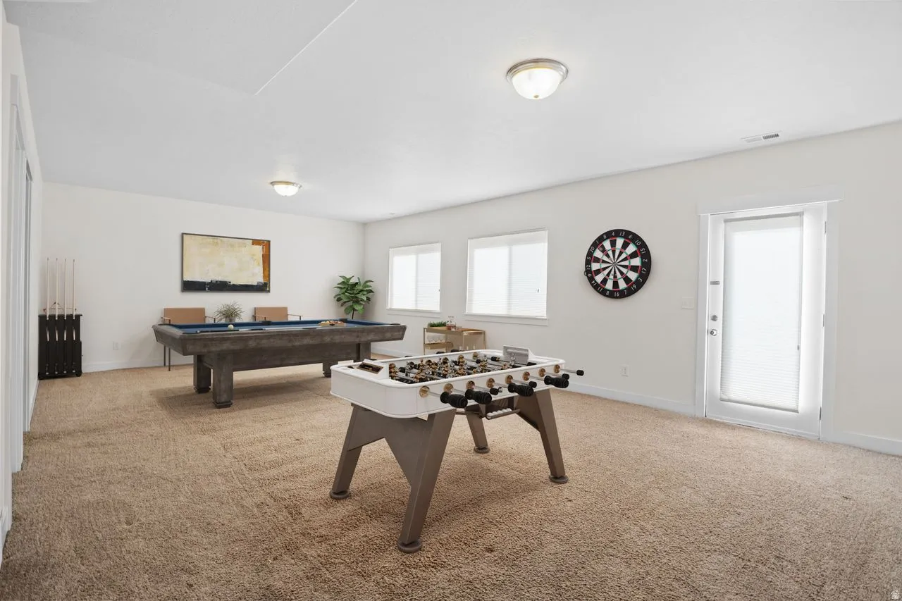 Recreation room with light carpet