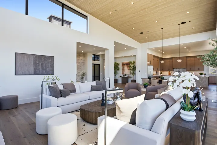 High ceilings with wood-finish paneling and recessed lighting