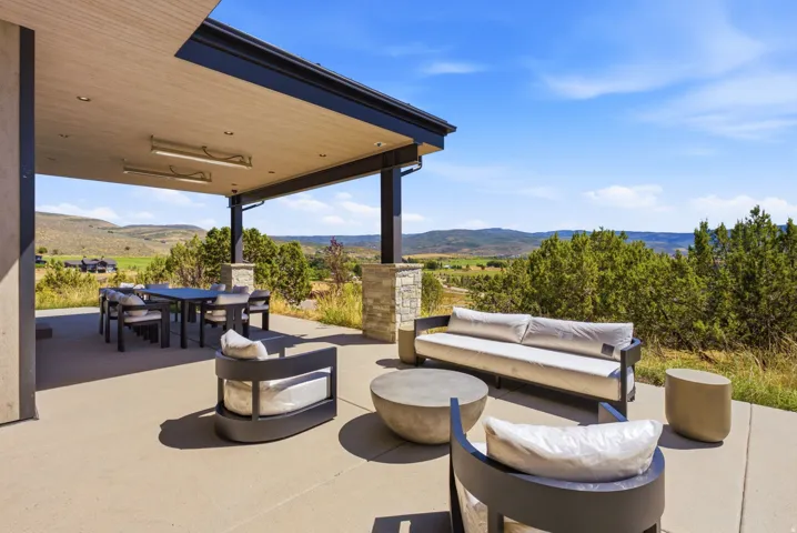 Covered outdoor patio with a concrete surface