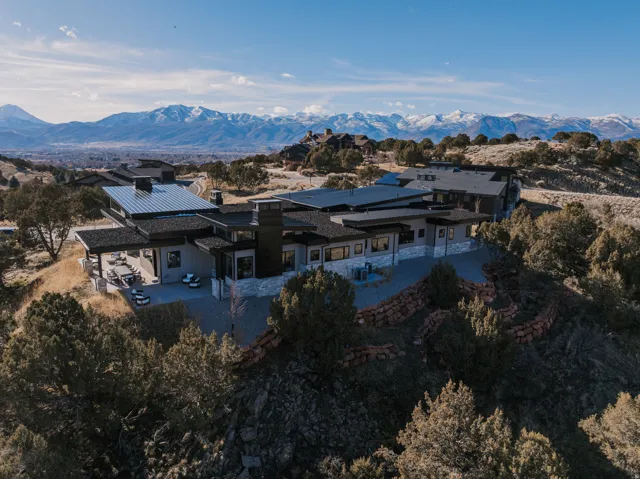 Modern architectural style with multiple rooflines and a neutral color palette