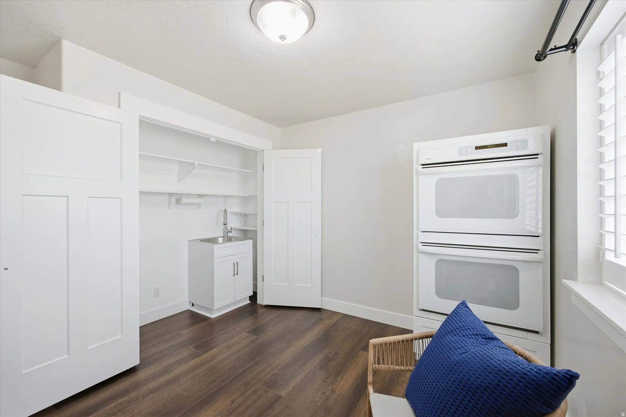 This can be either a bedroom or remain a prep-kitchen