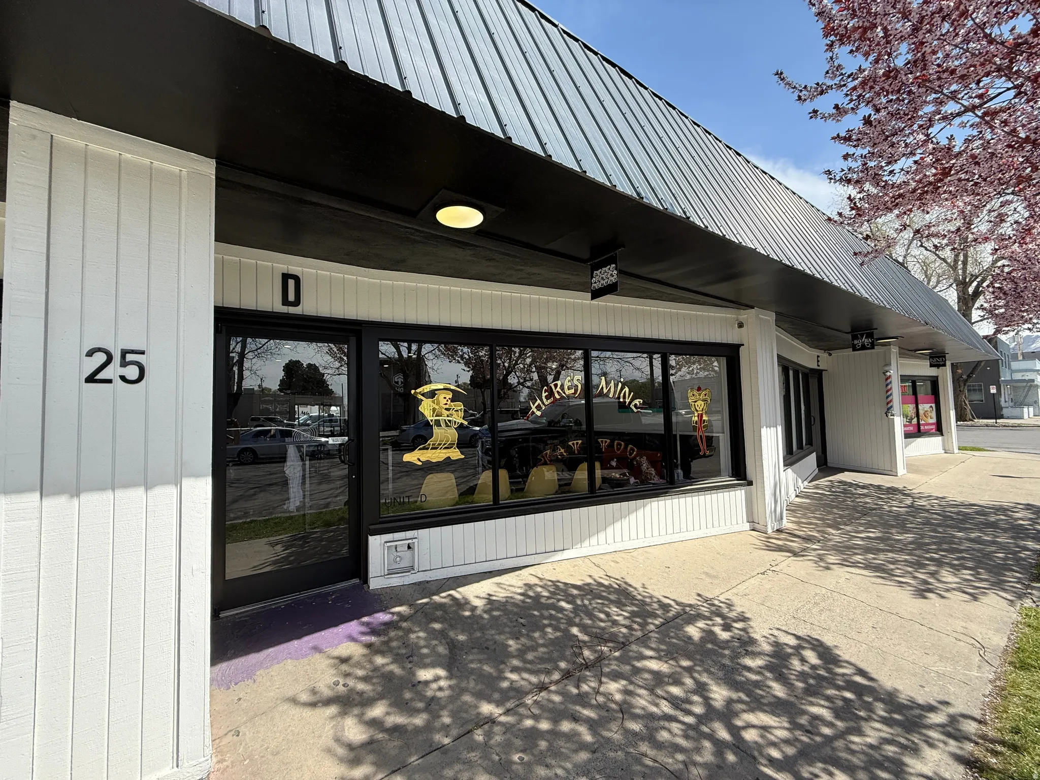 Entrance to property with a metal roof