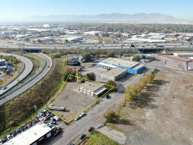 Aerial overview of property's location featuring property parcel outlined and a mountain backdrop
