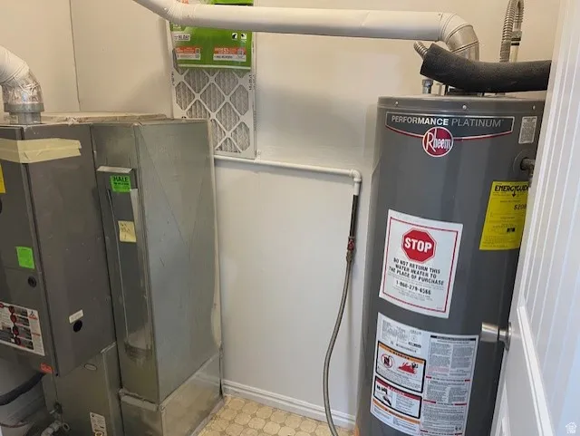 Utilities featuring gas water heater and heating unit