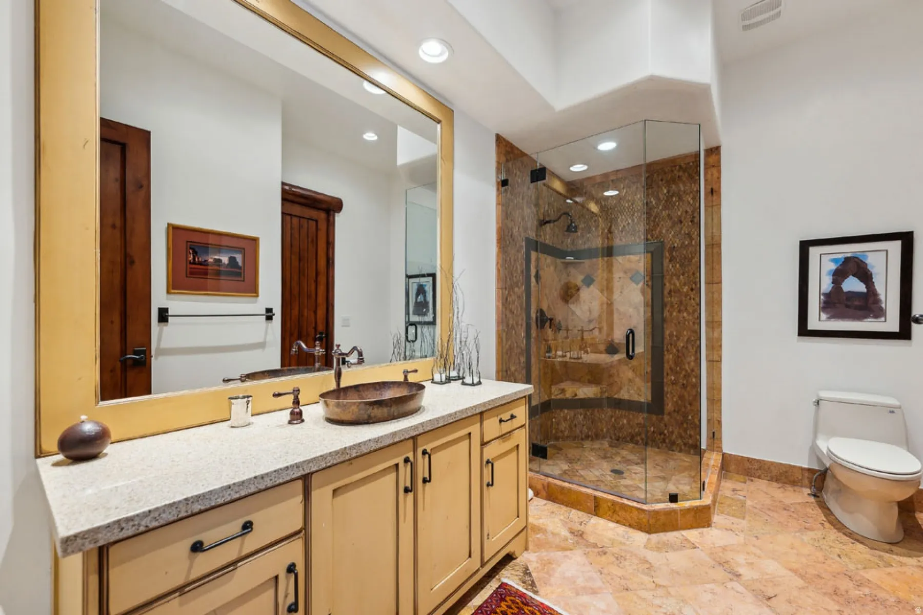 Full bath featuring vanity, a stall shower, and recessed lighting