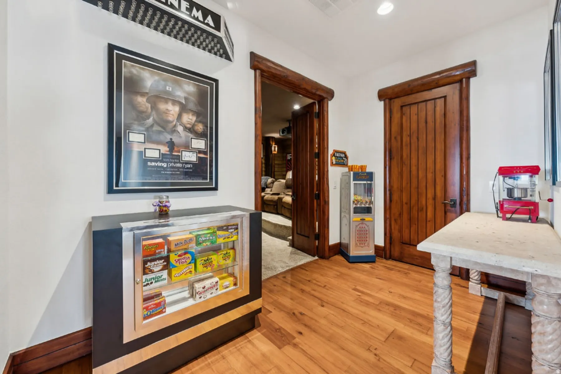 Corridor featuring light wood finished floors and recessed lighting