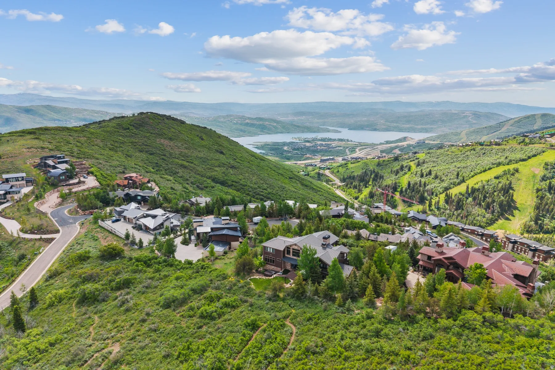 Aerial view of residential area with a mountain backdrop