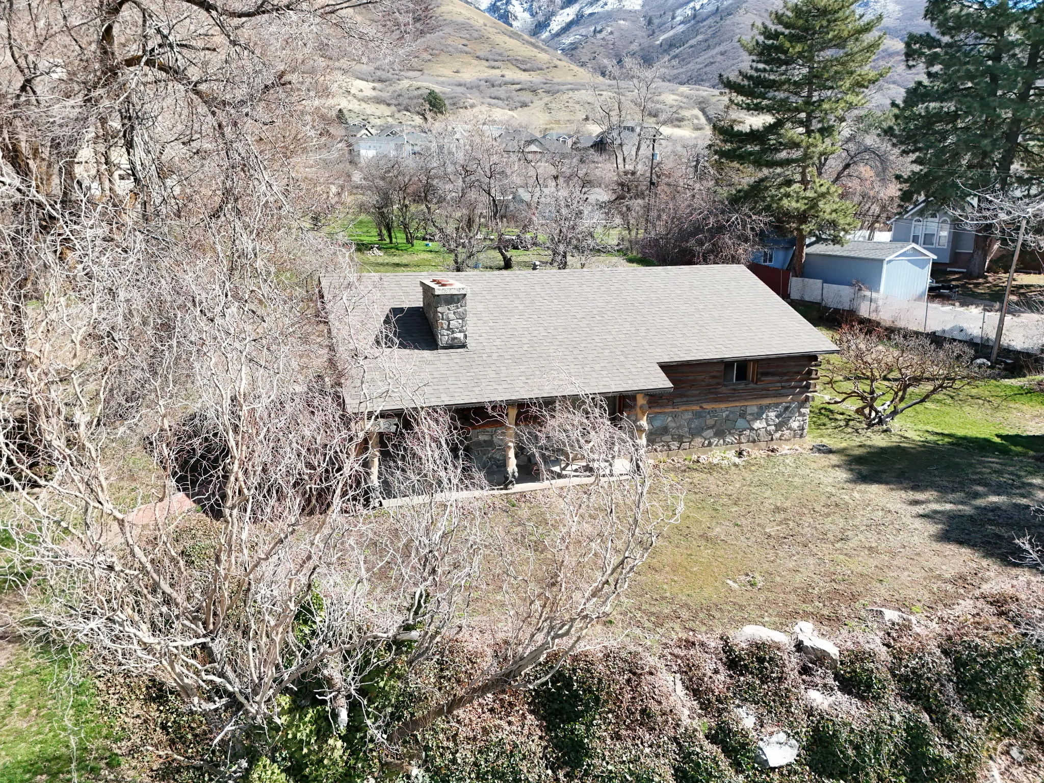 View from above of property featuring a mountainous background
