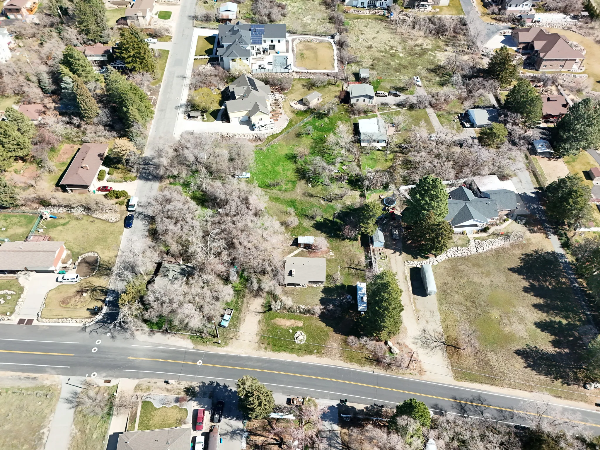 Aerial overview of property's location with nearby suburban area