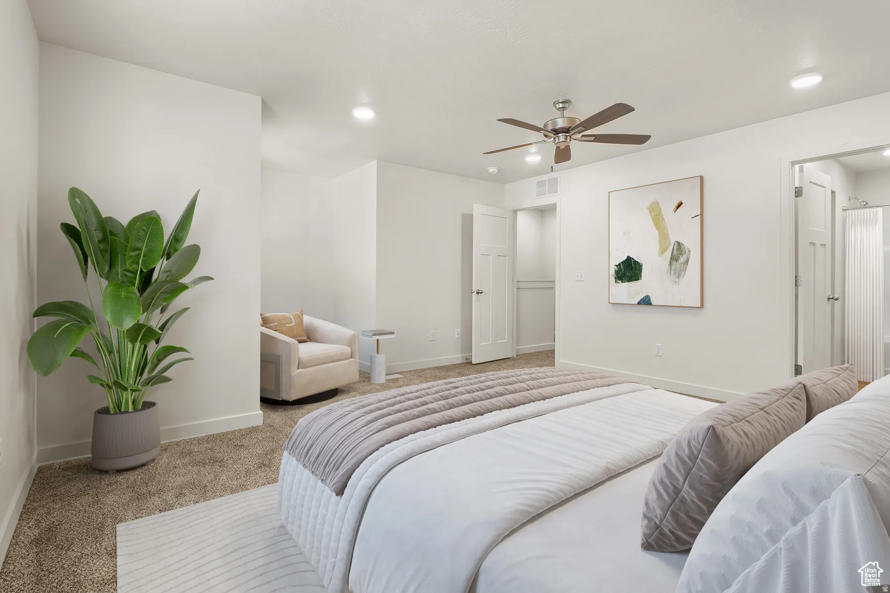 Bedroom with light carpet, recessed lighting, and ceiling fan