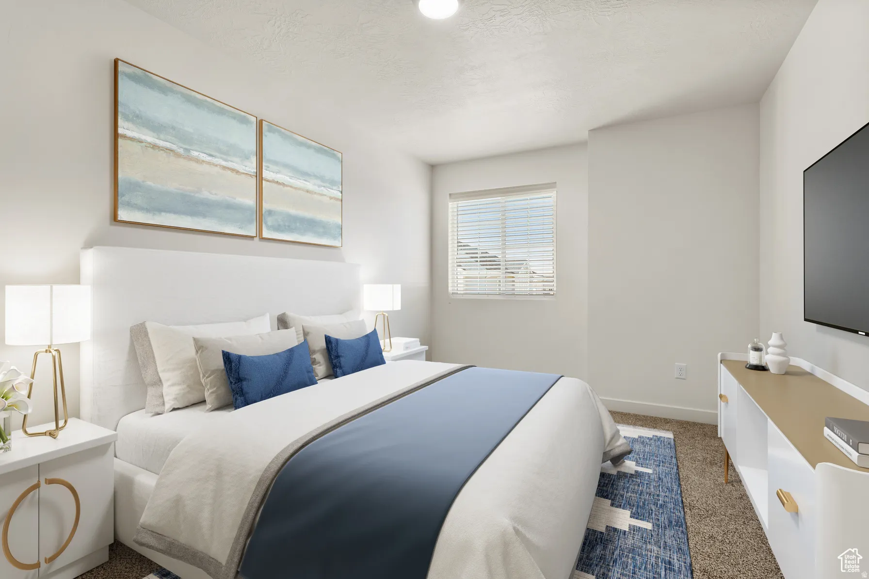 Bedroom featuring carpet floors and baseboards