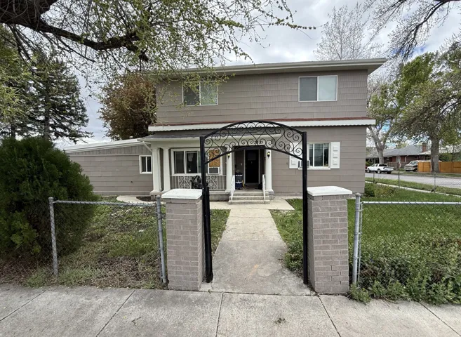 View of front of house with a gate and a fenced front yard