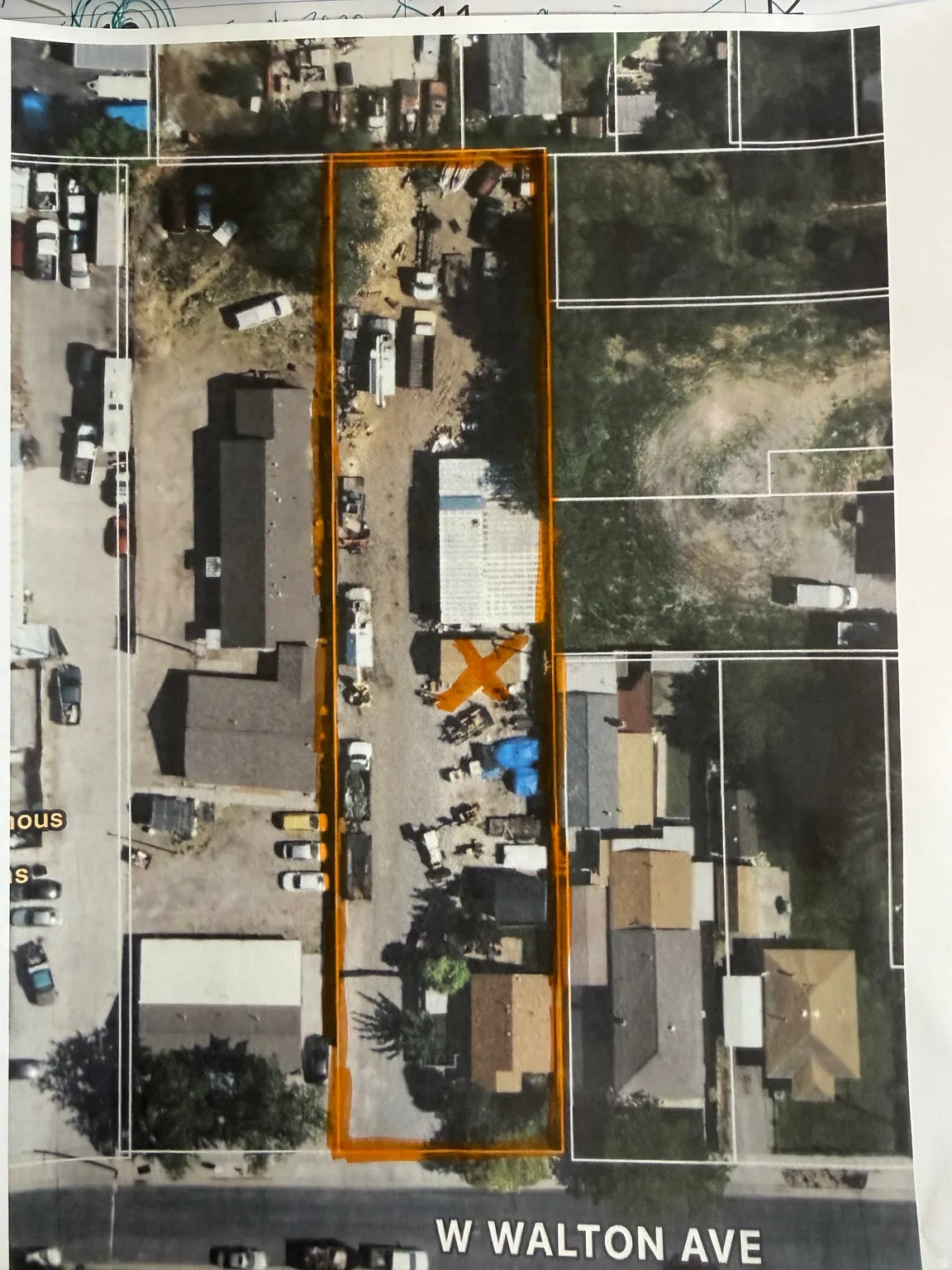 Aerial map of property and surrounding area with property parcel outlined