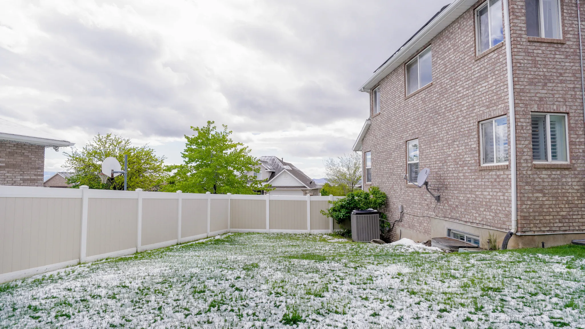 View of fenced backyard