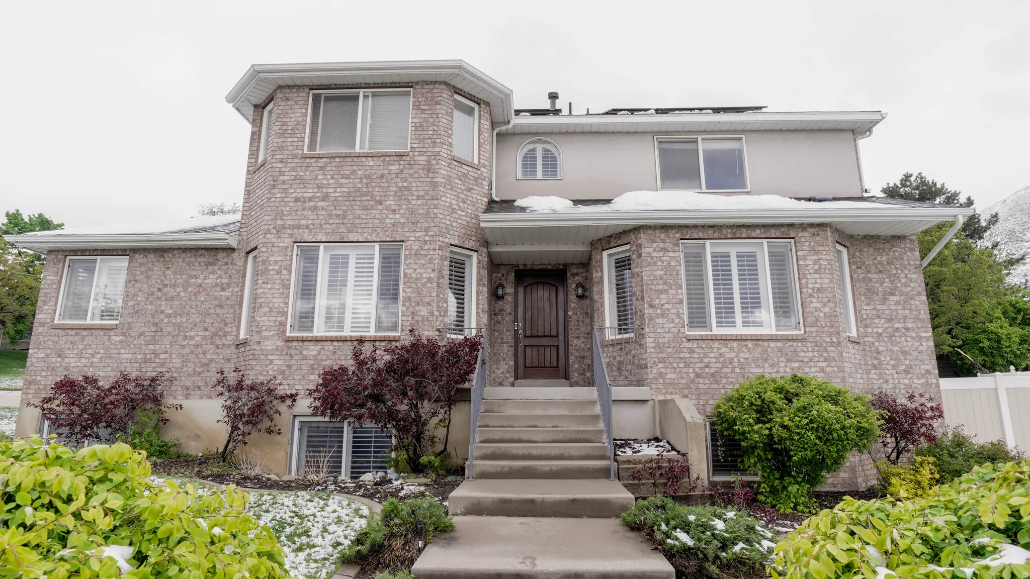 View of front facade with brick siding