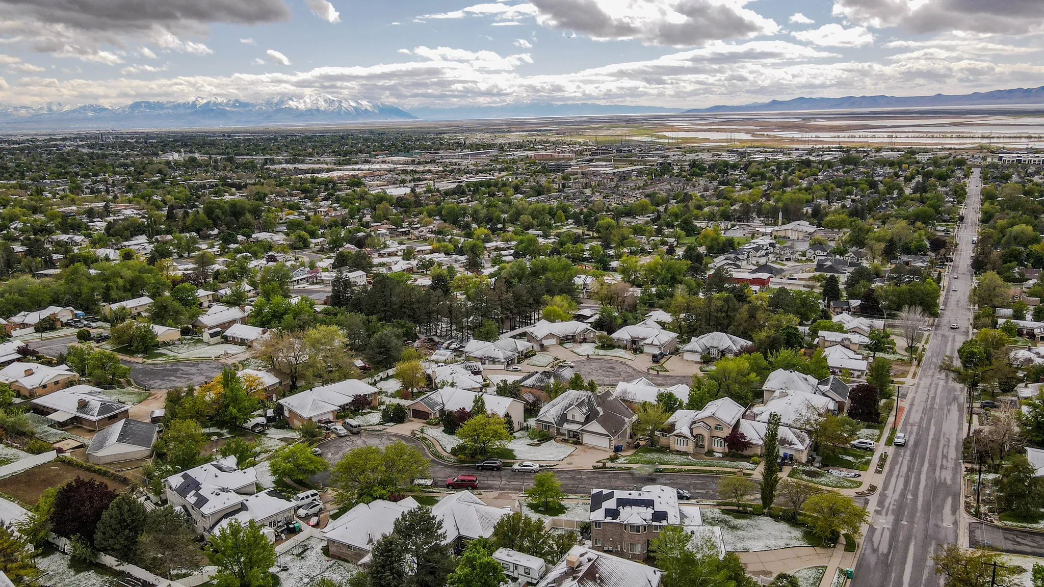 Aerial perspective of suburban area featuring mountains