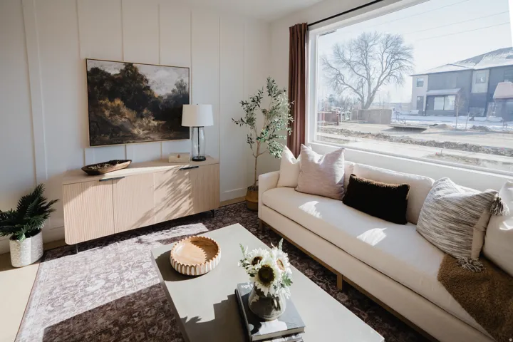 Living area featuring a decorative wall