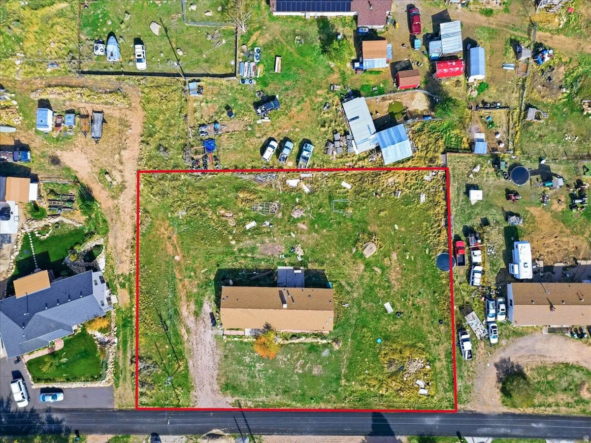 Aerial view of property's location featuring property parcel outlined
