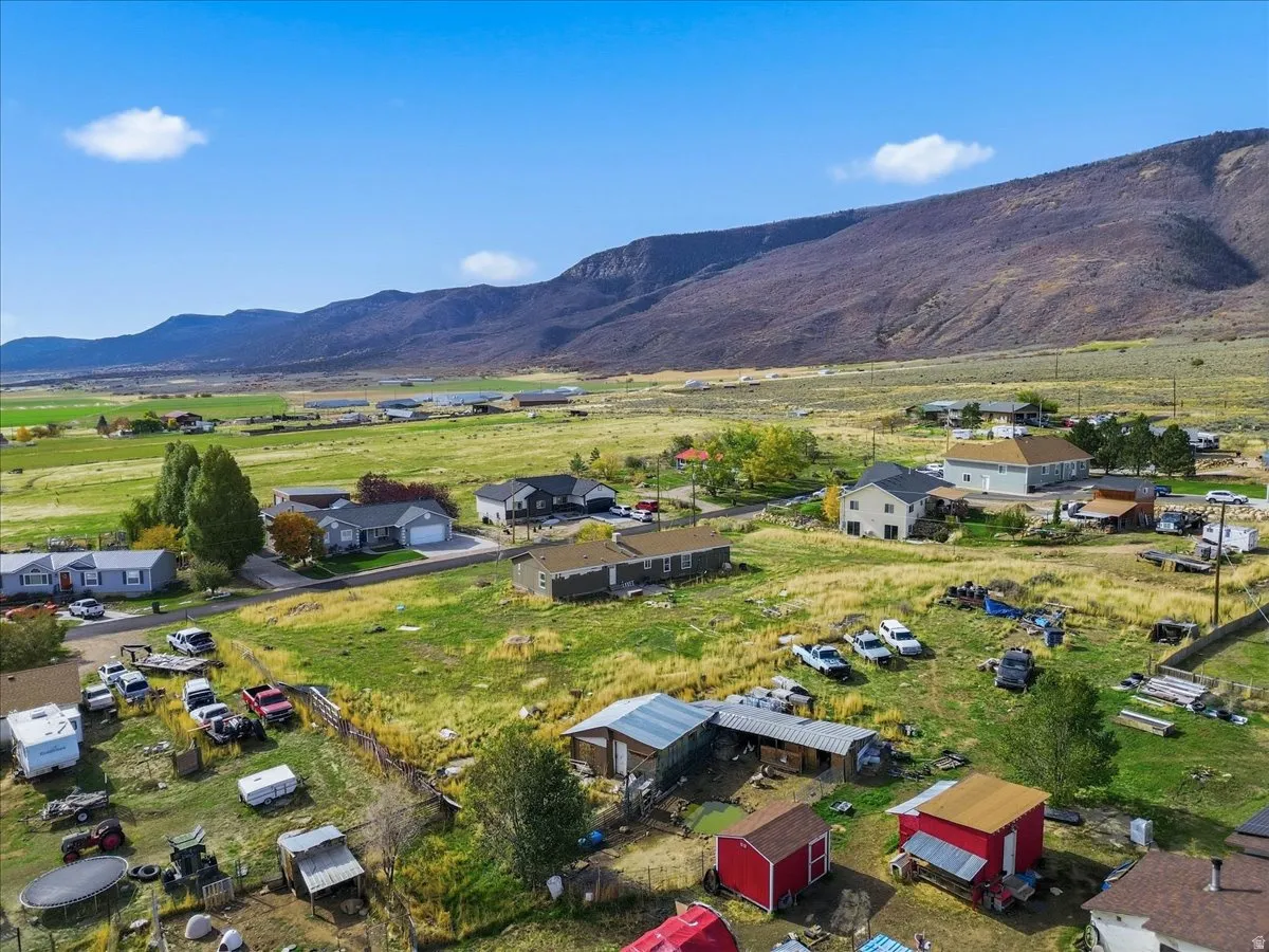 View of property location with nearby suburban area and a mountainous background