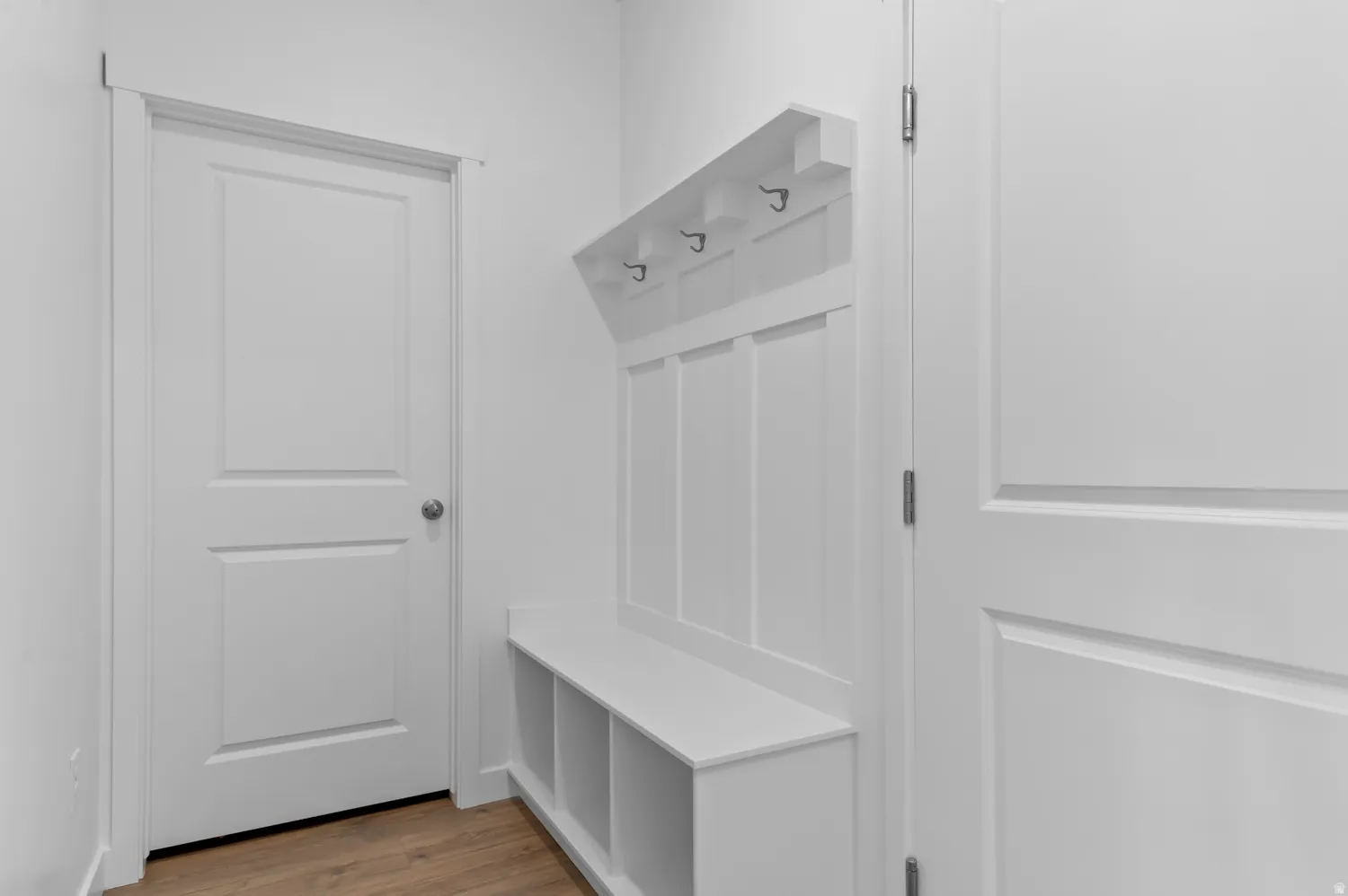 Mudroom with light wood-type flooring
