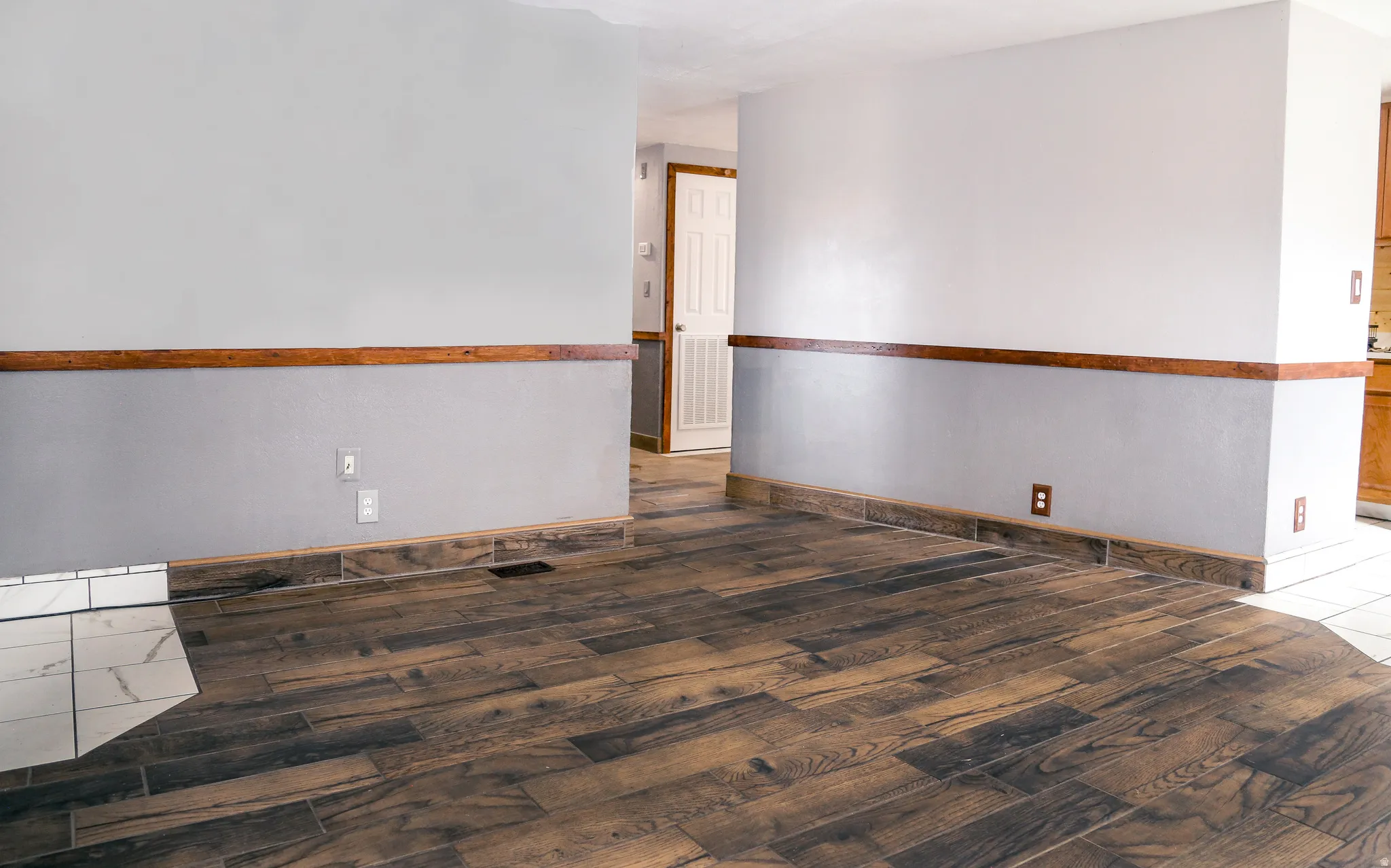 Spare room with hardwood / wood-style floors