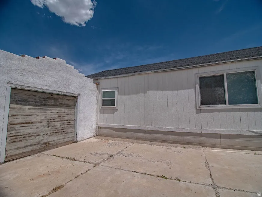 Garage featuring driveway