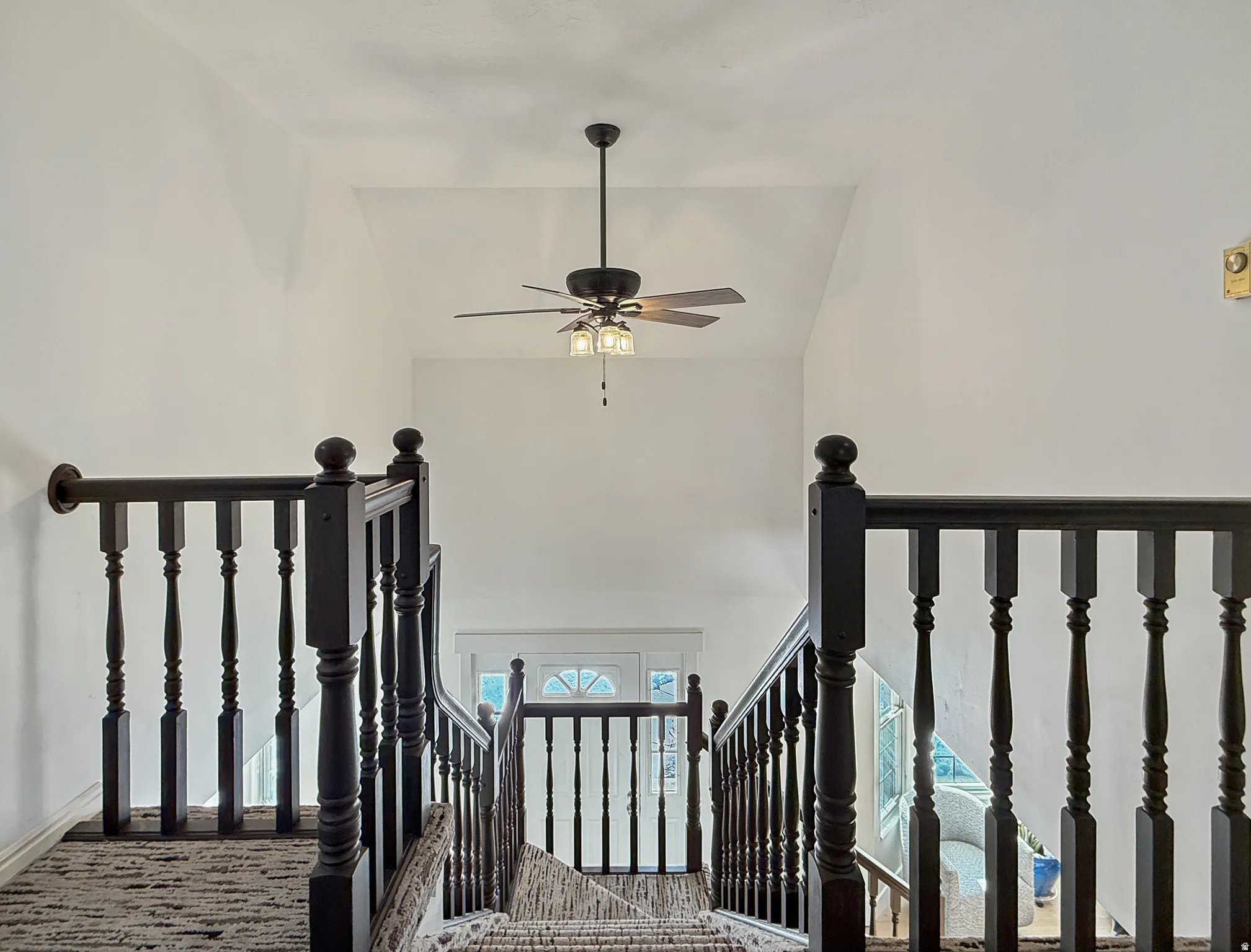 Stairway with ceiling fan