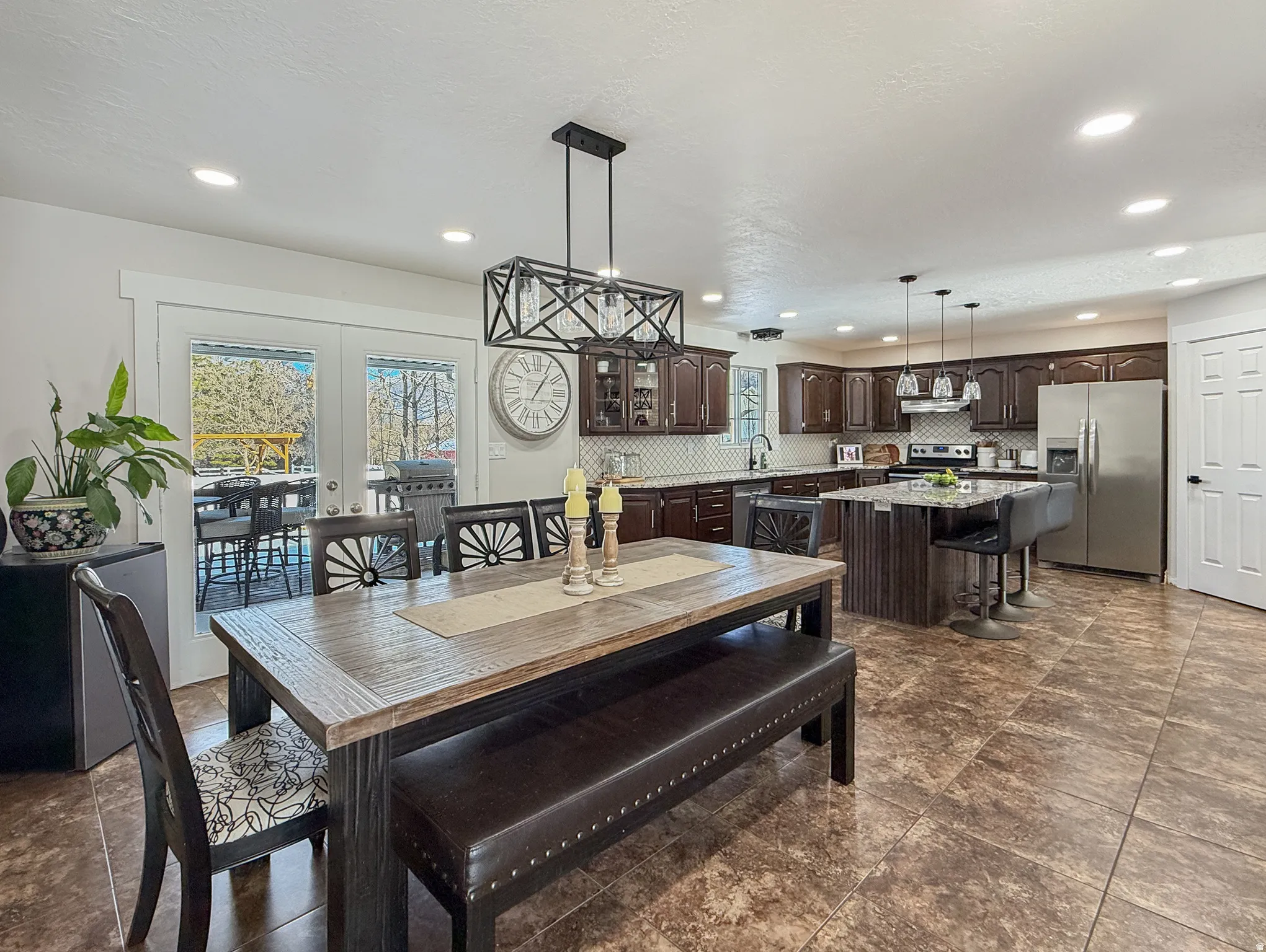 Dining space featuring french doors and recessed lighting