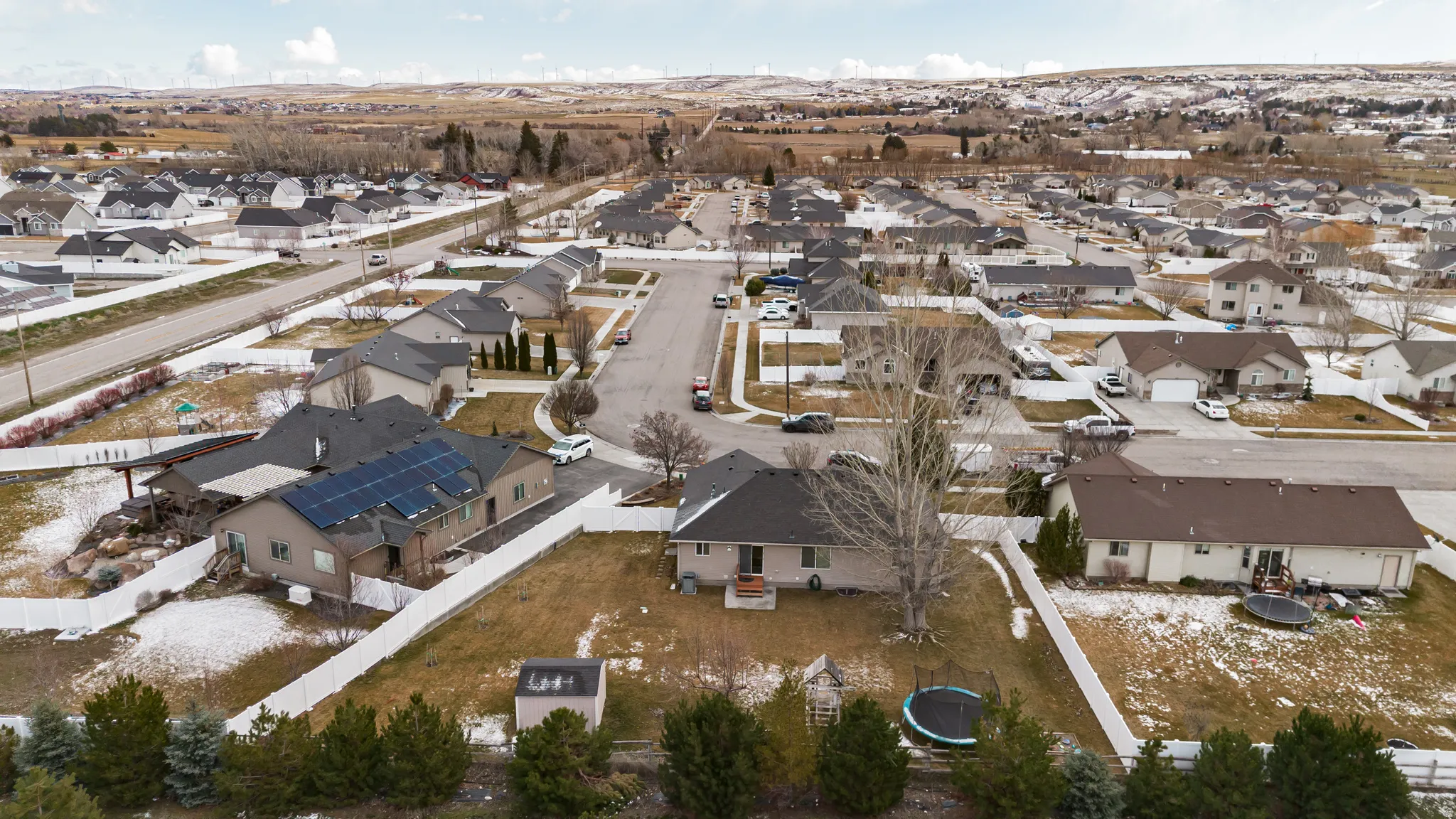 Aerial view of property's location featuring nearby suburban area