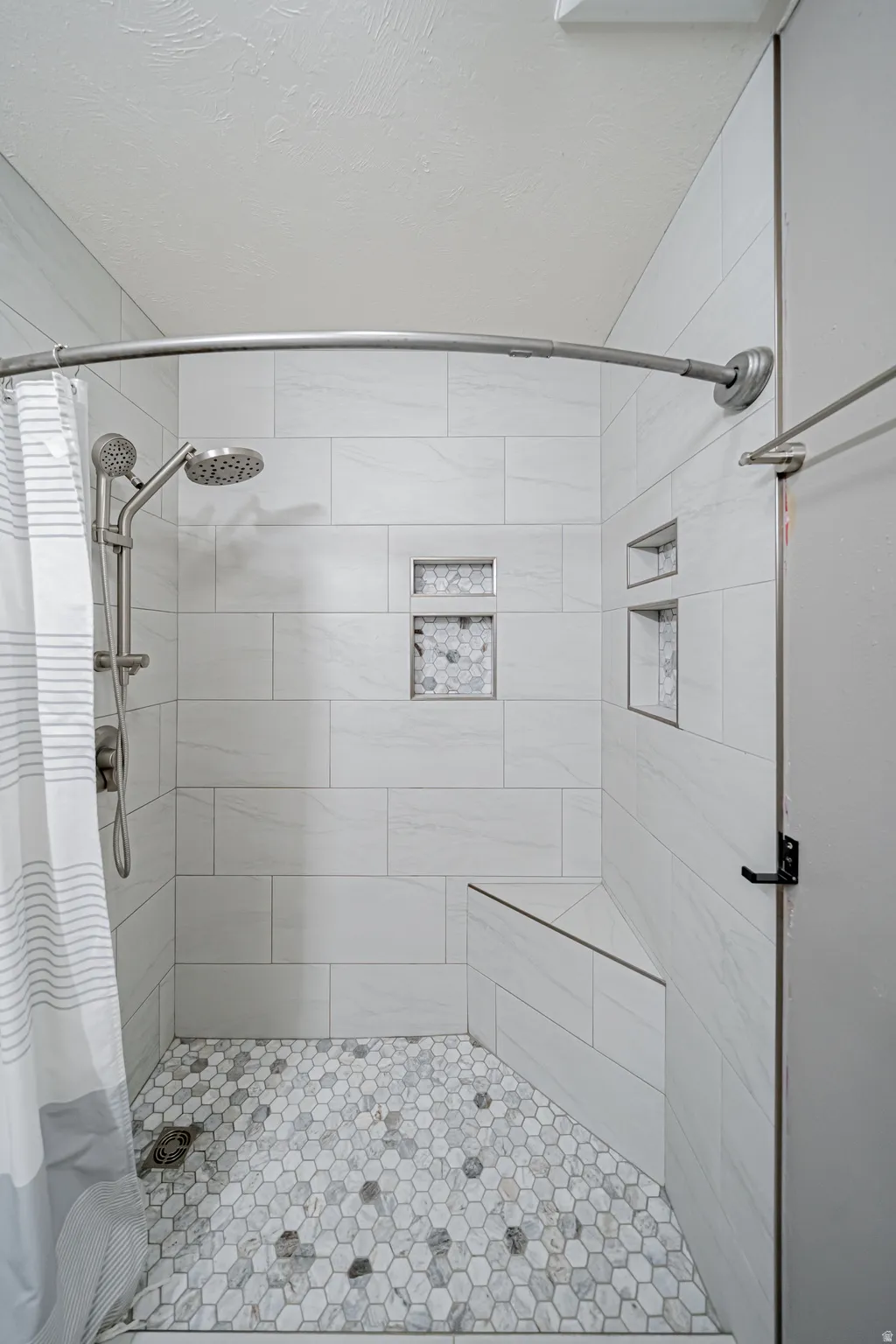 Bathroom featuring a stall shower
