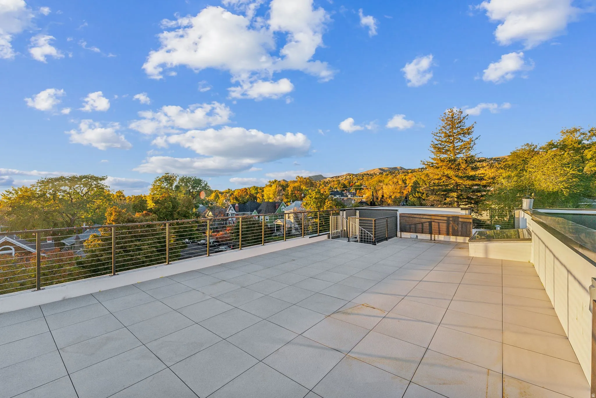 View of patio with a view of trees