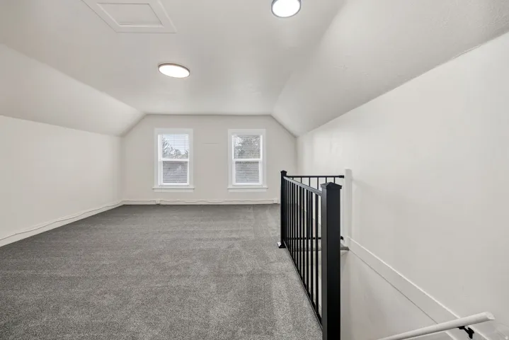 Bonus room with carpet flooring