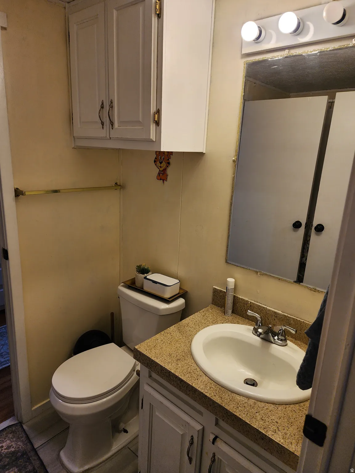 Bathroom with vanity and tile patterned floors